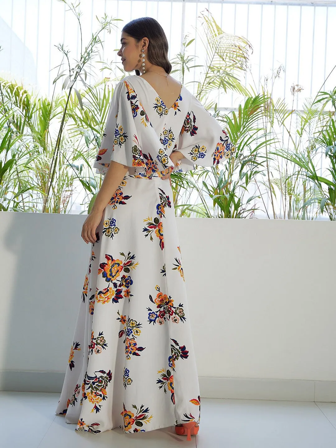 Berrylush Women White & Orange Floral Printed V-Neck Bell Sleeves Flared Maxi Dress