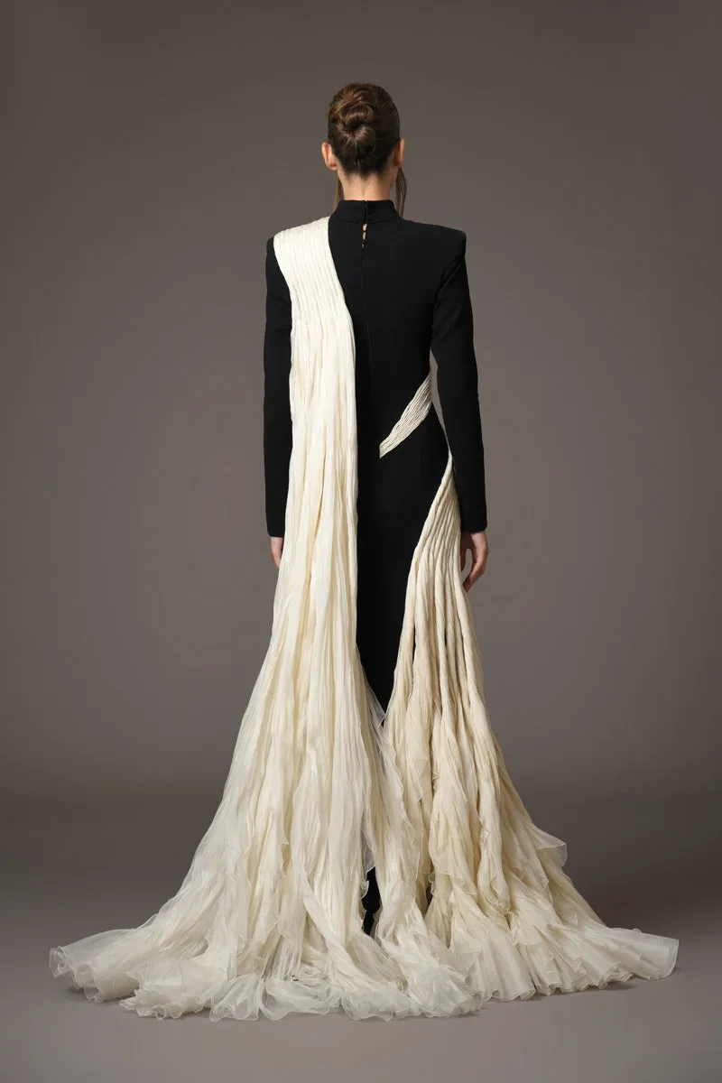 Black silk crêpe dress, with a dramatic mermaid tail of rippling silk organza