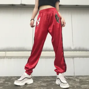 Demon print satin joggers